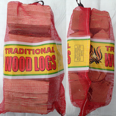 Shop netted bags of seasoned hardwood logs